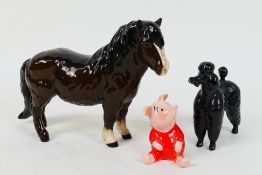 Beswick - Lot to include a Shetland pony figure, poodle and a Walt Disney Piglet figure,