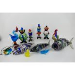 A collection of glass fish, clowns and similar to include Murano, largest approximately 38 cm (l).