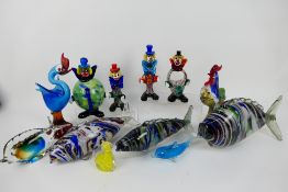 A collection of glass fish, clowns and similar to include Murano, largest approximately 38 cm (l).