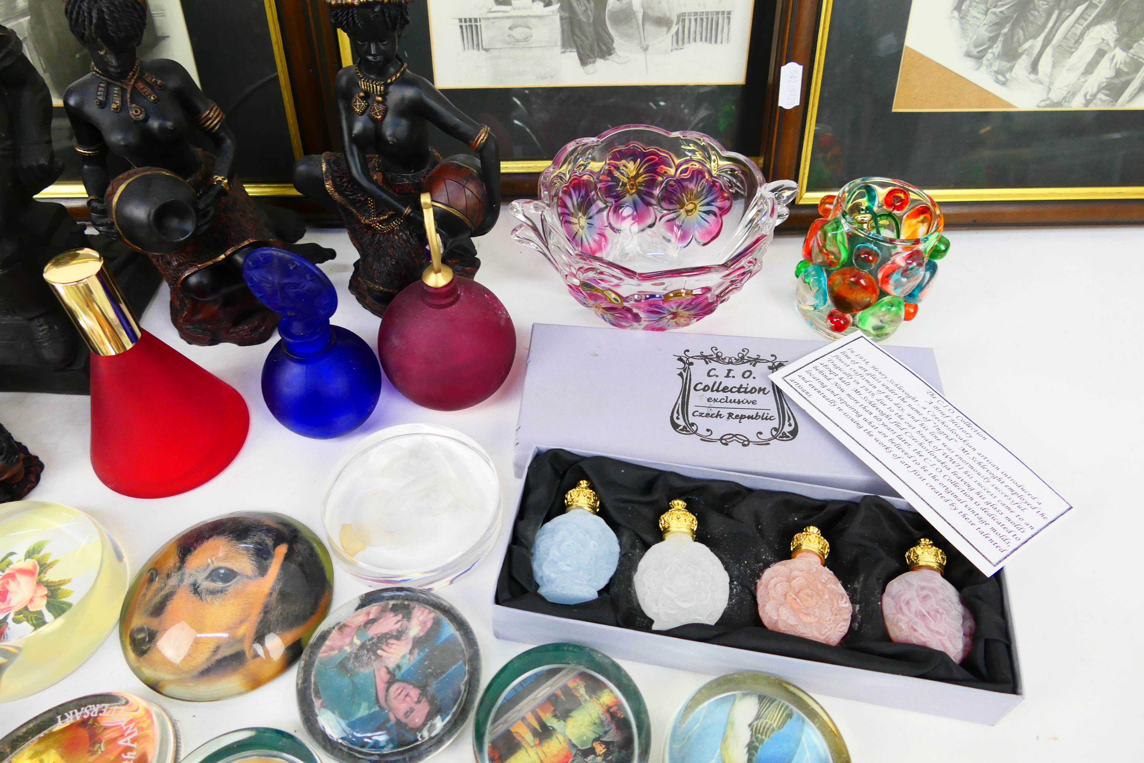 A mixed lot to include paperweights, Laurel & Hardy prints and wall clocks, various ornaments, - Image 5 of 7