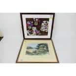 Two framed pictures to include a watercolour landscape scene and a still life,