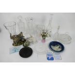 A quantity of glassware to include decanters, vases and other, model elephants,