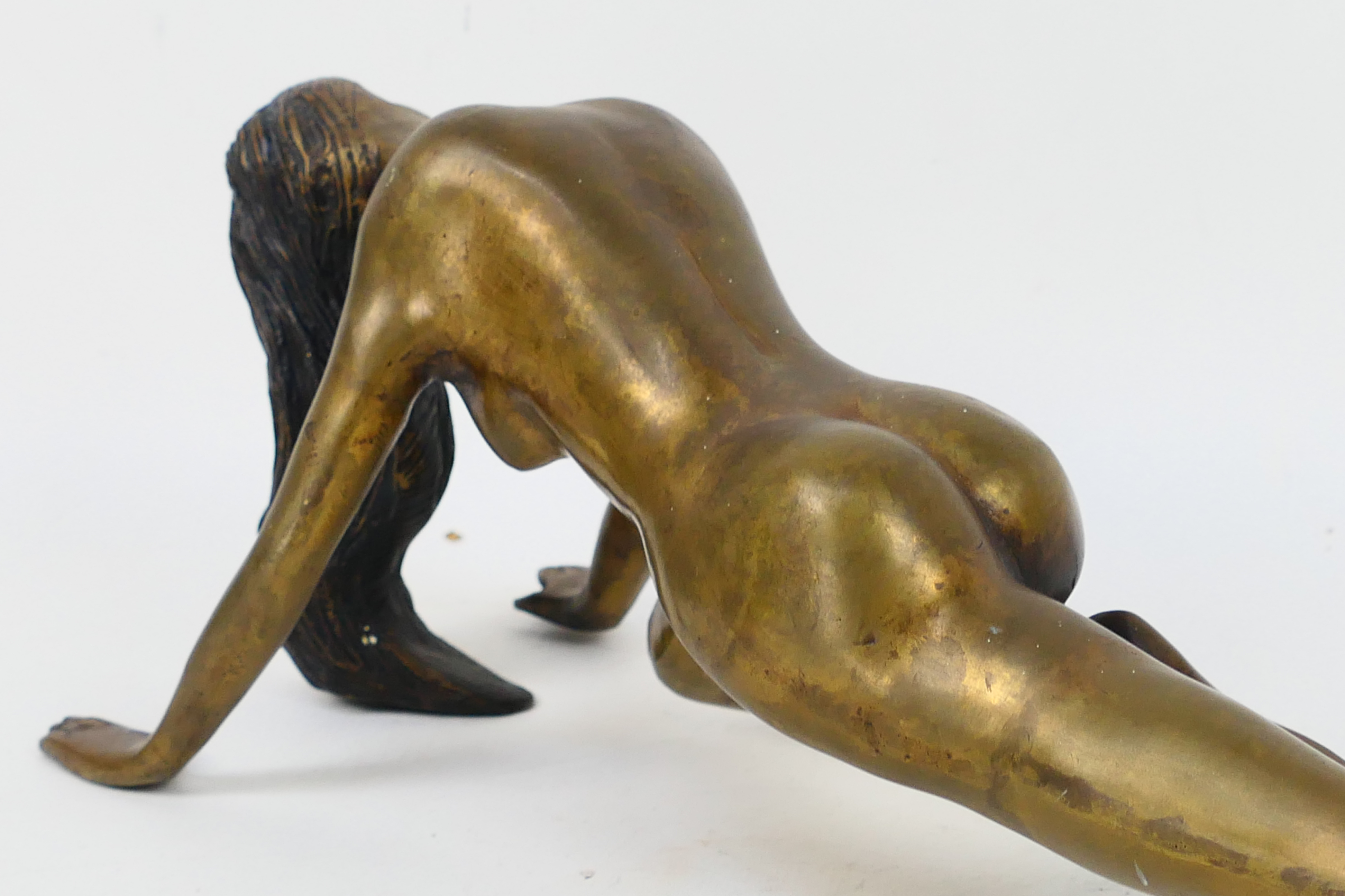 A cast bronze model depicting a female nude, approximately 49 cm (l). - Image 3 of 6