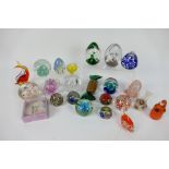 A quantity of paperweights to include Avondale Glass,