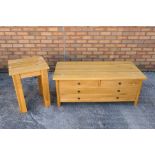 A low chest of two over two drawers,