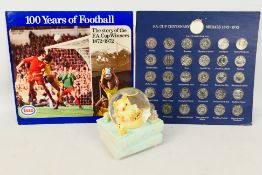 An ESSO FA Cup Centenary Collector Coin Set and a Disney Winnie The Pooh snow globe.