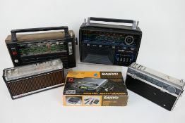 A collection of vintage radios and similar to include a Selena Vega,