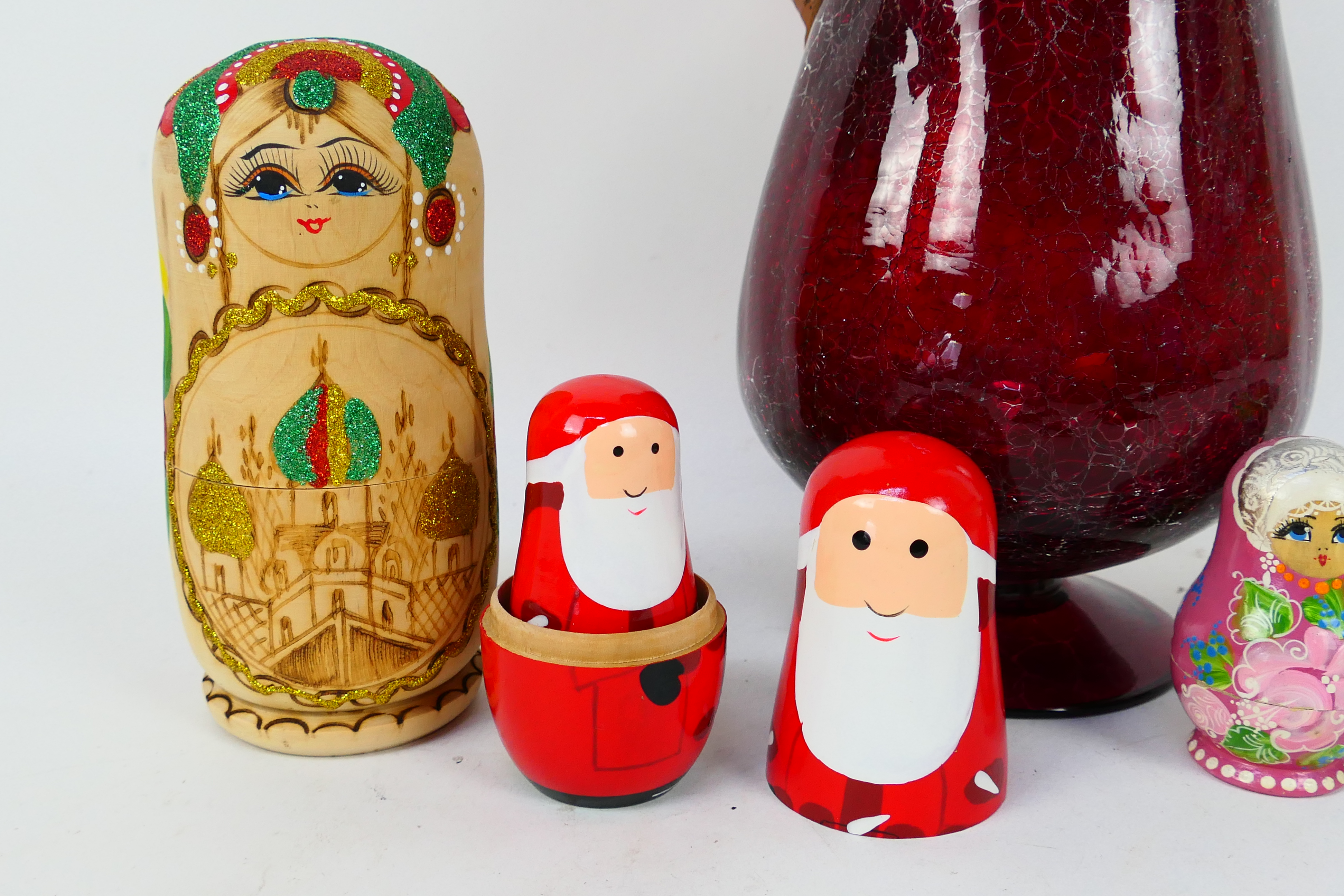 A decorative windlight candle holder, 30 cm (h) and four set of Russian matryoshka nesting dolls, - Image 2 of 3