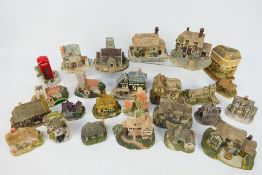 A quantity of model cottages and similar
