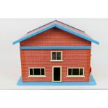 Unknown Maker - A wooden two storey dolls house measuring 53 x 46 x 40 cm.