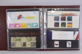Philately - Two albums of Royal Mail Mint Stamp Presentation Packs, in excess of £420 face value.