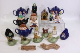 A collection of promotional Tetley Tea wares to include teapots, toast rack,