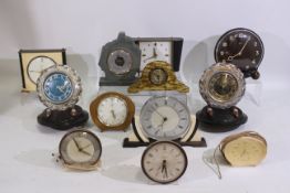 A quantity of vintage desk and mantel clocks to include Smiths, Vega, Metamec and other.