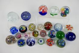 A collection of various paperweights. Condition Report: No makers's marks apparent.