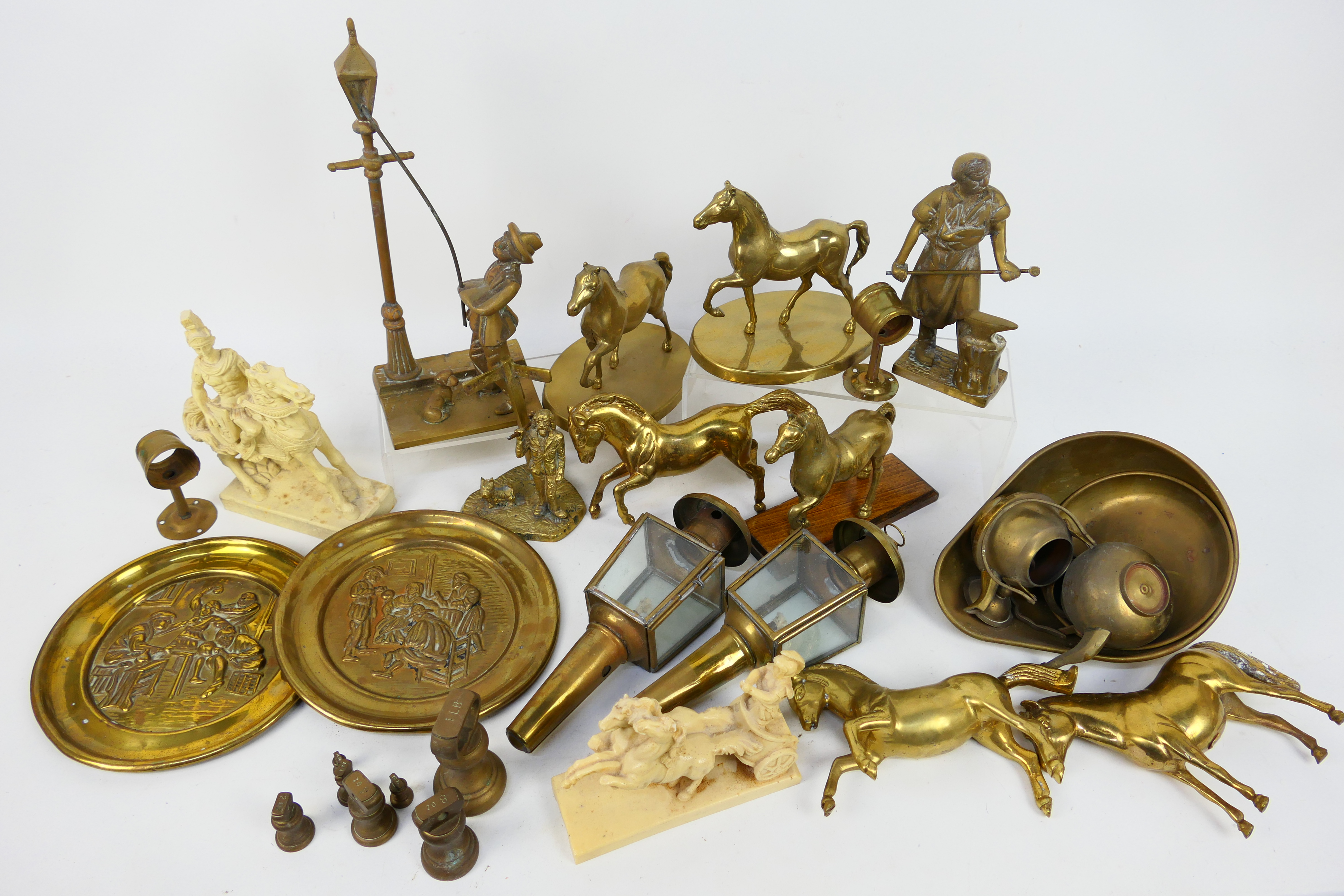 A quantity of brassware to include lanterns, ornaments and similar.