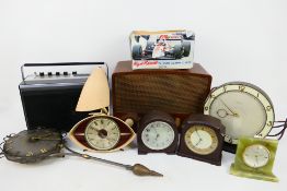 Vintage radios to include a Sanyo M4400F radio cassette recorder and a quantity of clocks to