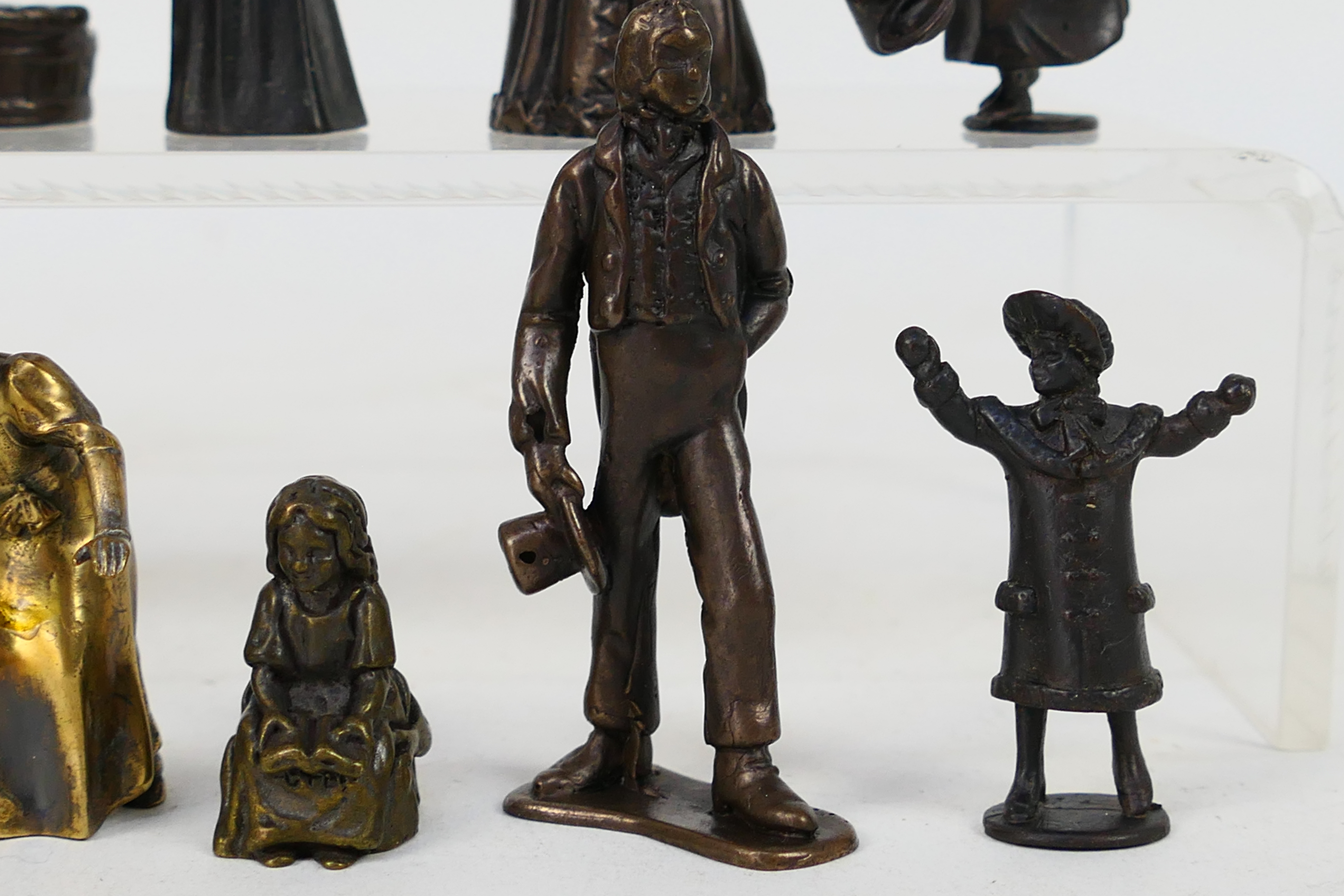 A collection of bronze figures to include Victorian style, servants, children and similar, - Image 5 of 5