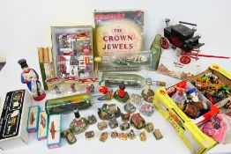 A mixed lot to include toys, vintage ships in bottles, Lemax Village Accessories,