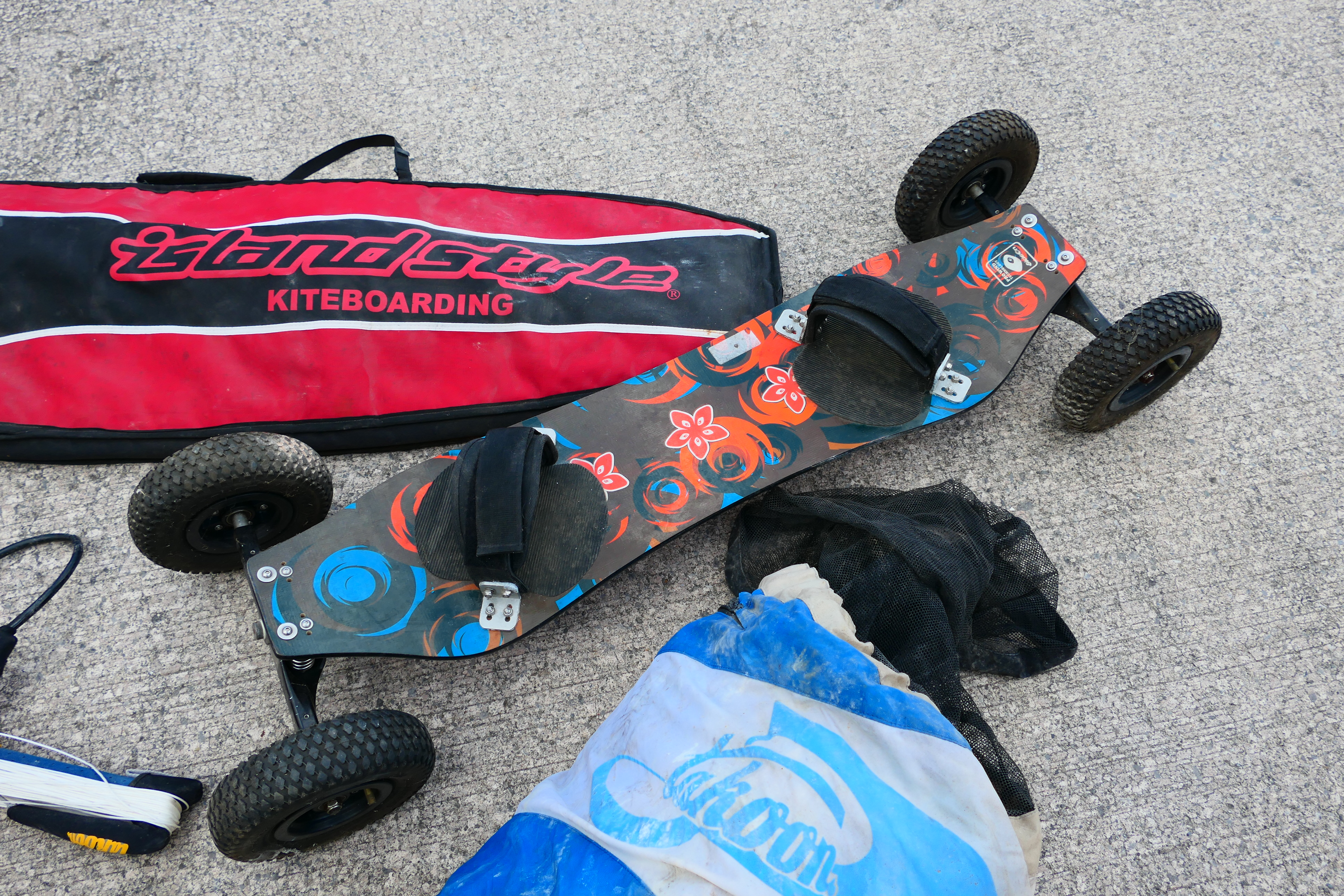 A collection of kite surfing equipment and accessories. - Image 6 of 7