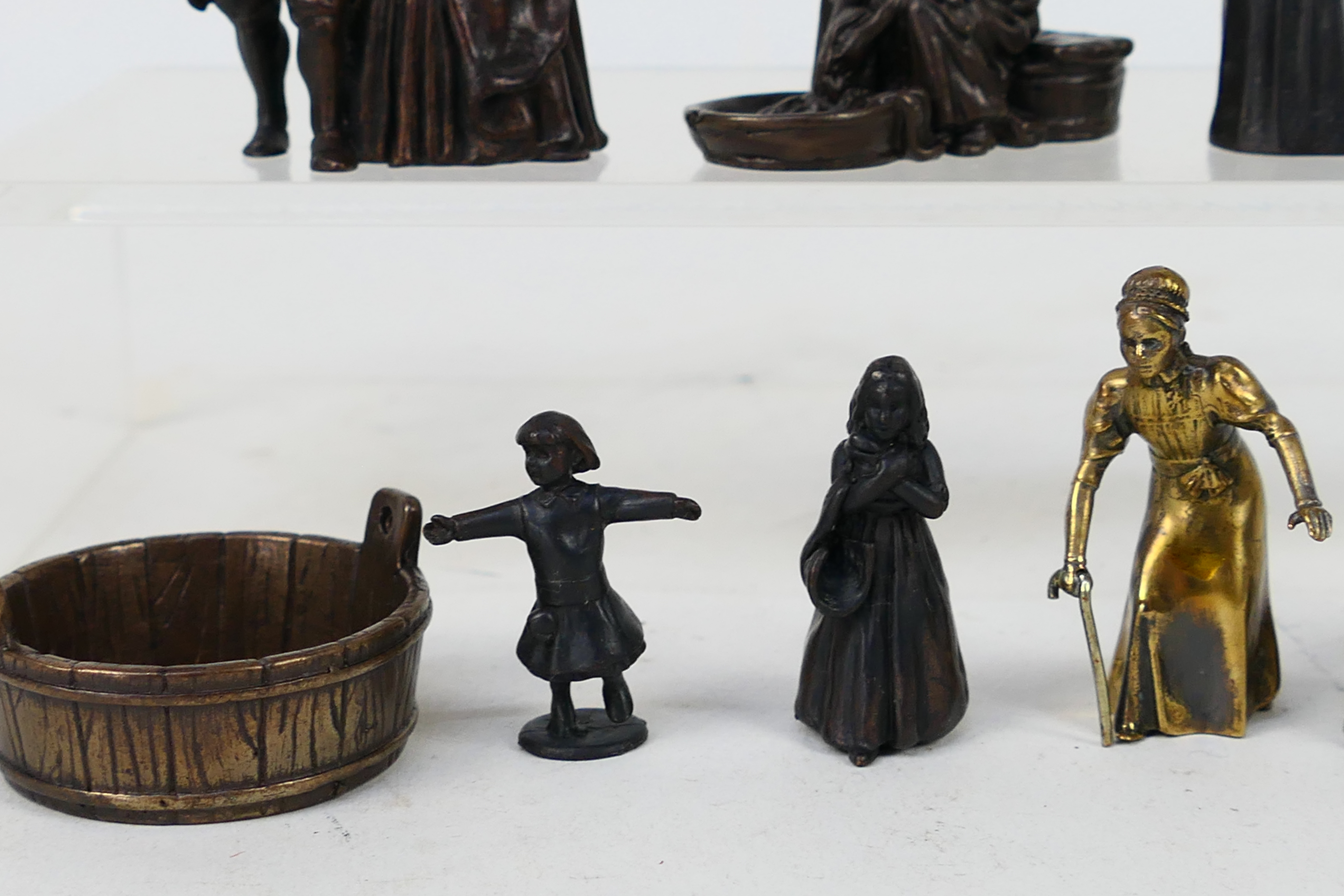 A collection of bronze figures to include Victorian style, servants, children and similar, - Image 4 of 5