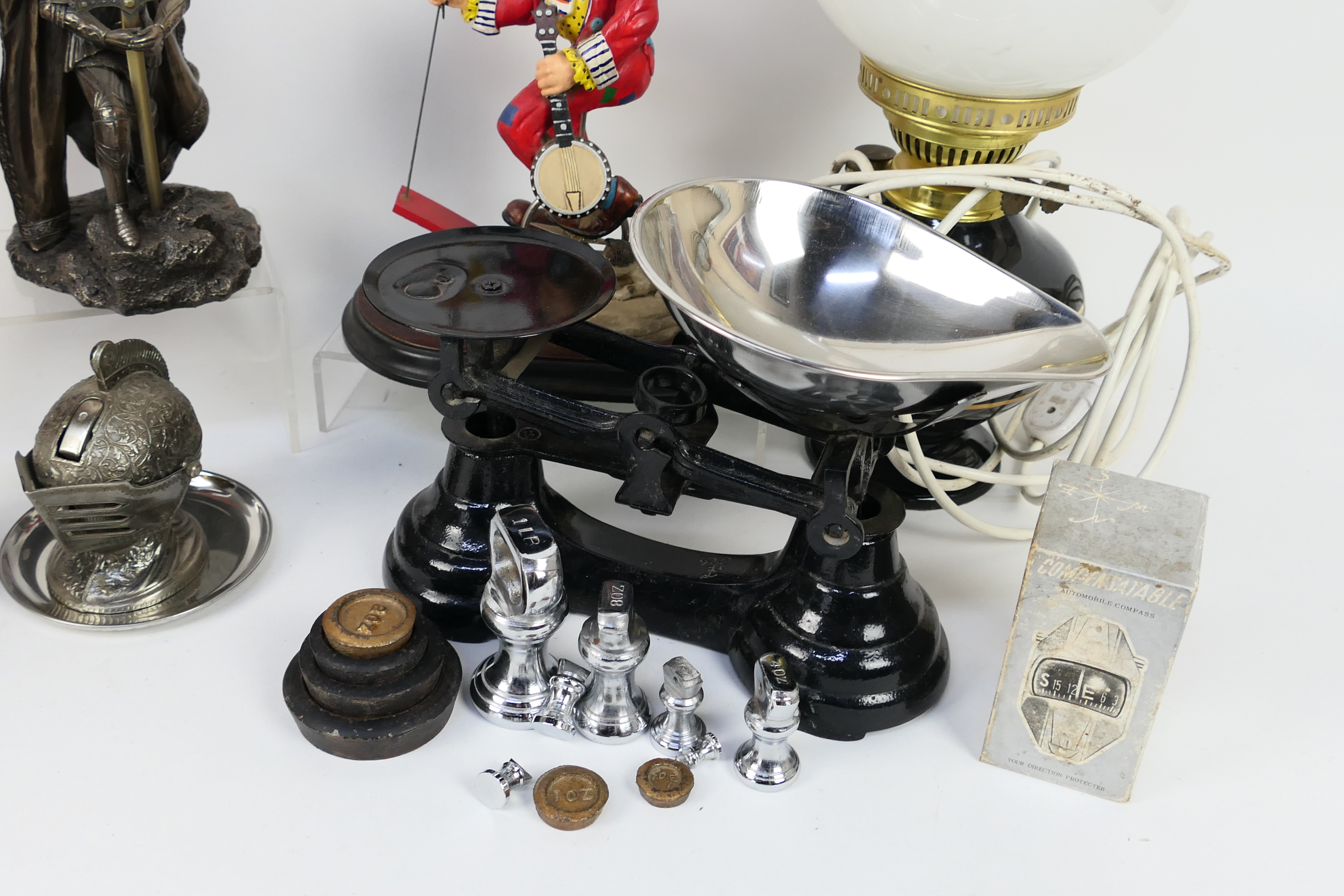 A mixed lot to include converted oil lamp, clown figure, scales, novelty table lighter and similar. - Image 5 of 6