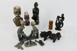 Ethnographica - Tribal carvings to include stone busts, carved wood animals,