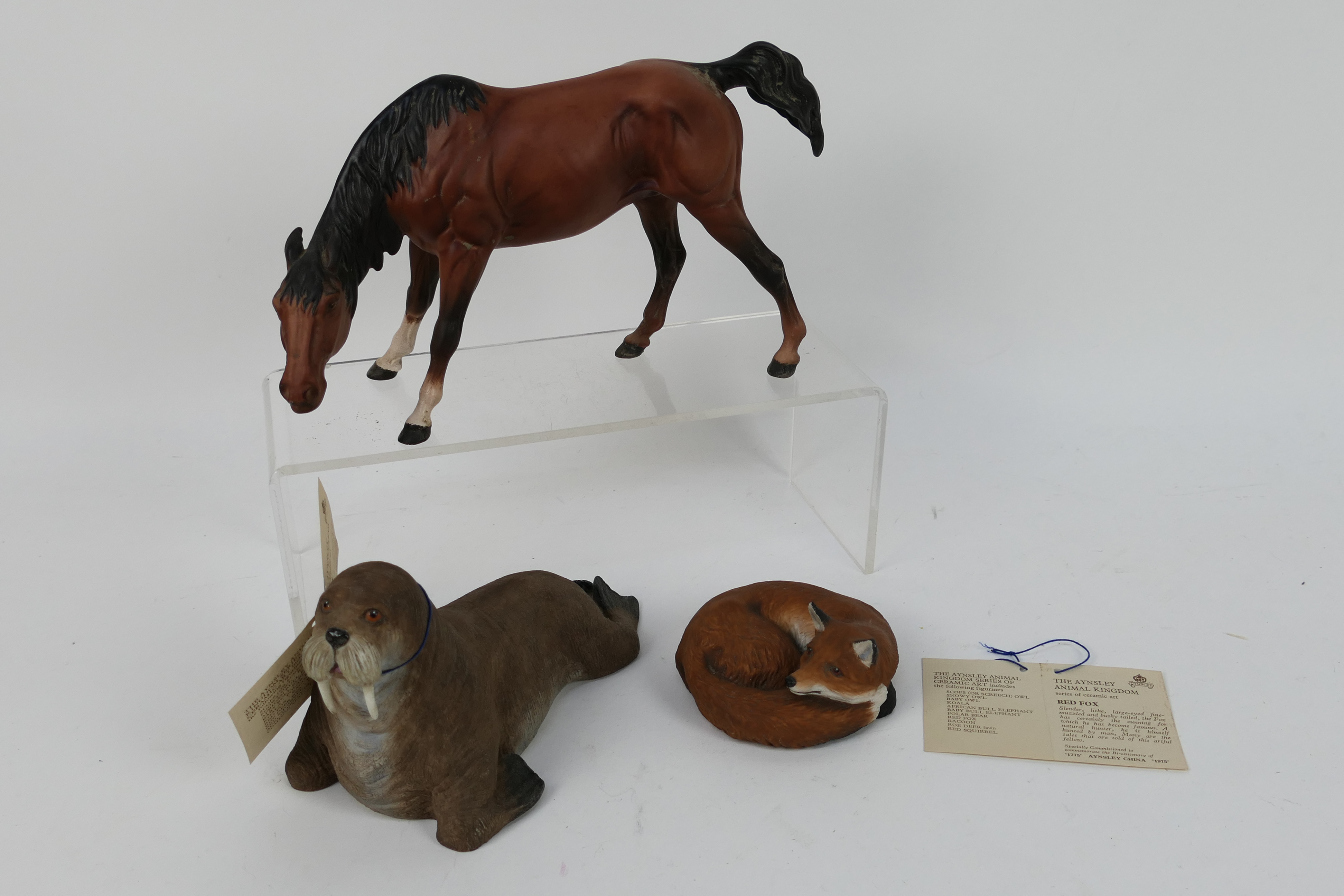 Lot to include two Aynsley animal figures from the Aynsley Animal Kingdom collection comprising Red