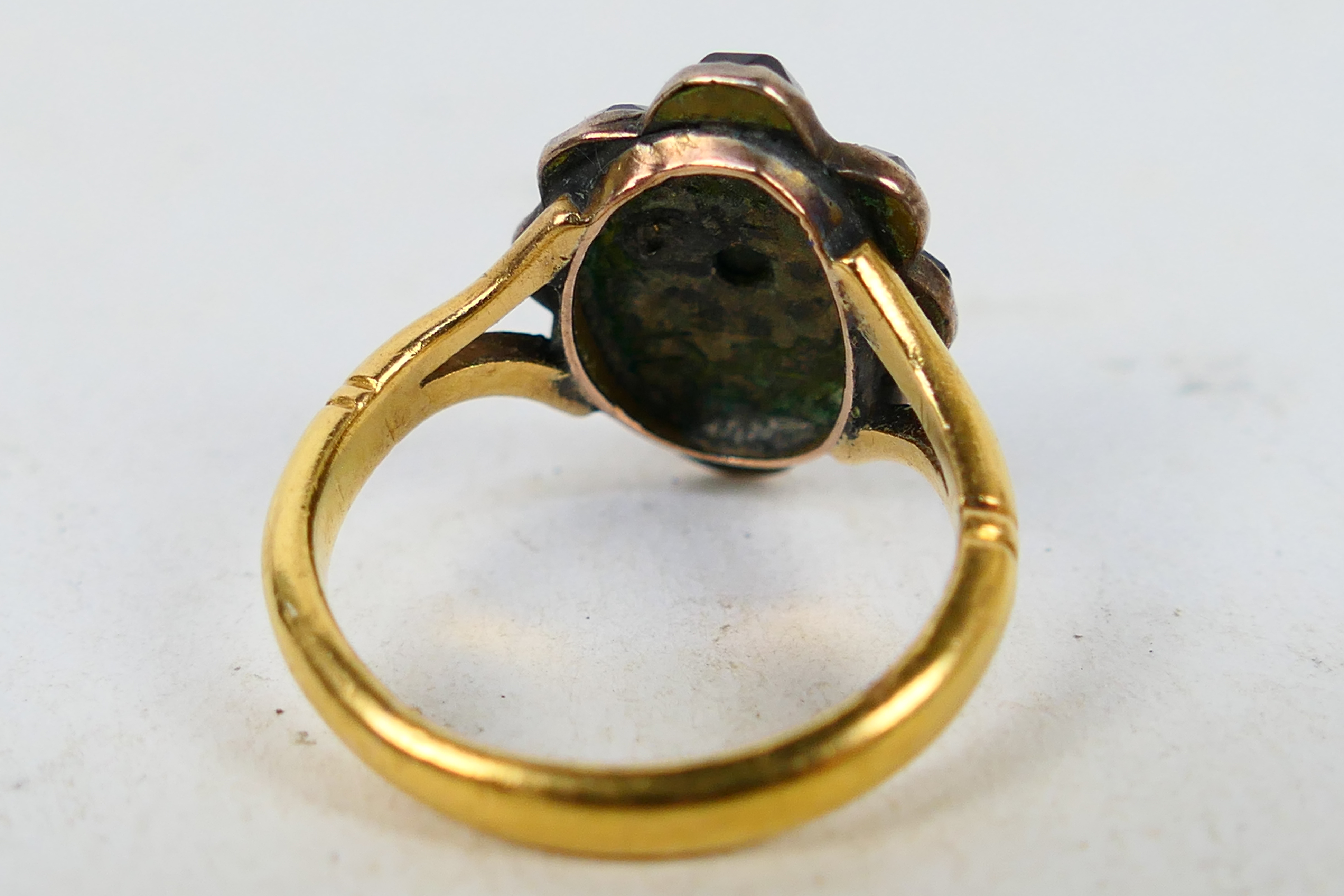 A high purity yellow metal, stone set ring, stamped 22ct, size L, approximately 4.6 grams. - Image 3 of 4