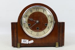 An Art Deco styled oak cased Westminster chiming mantel clock, opening chrome bezel,