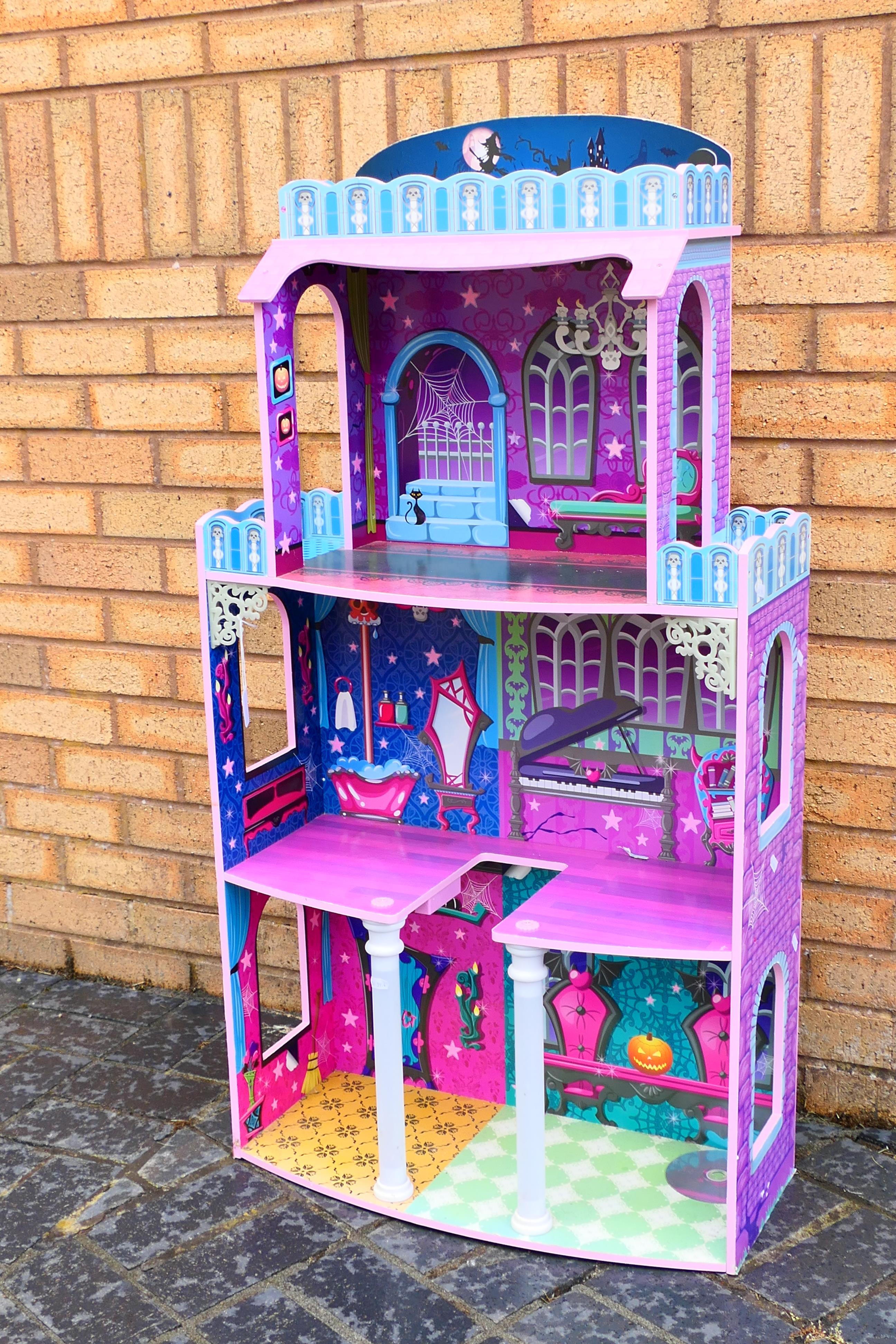 A Monster High dolls house measuring 118 x 62 x 29 cm with light up pillars. - Image 2 of 4