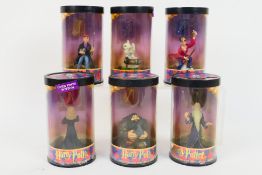 A set of six Enesco Harry Potter Hero Series Mini Figures contained in original packaging.