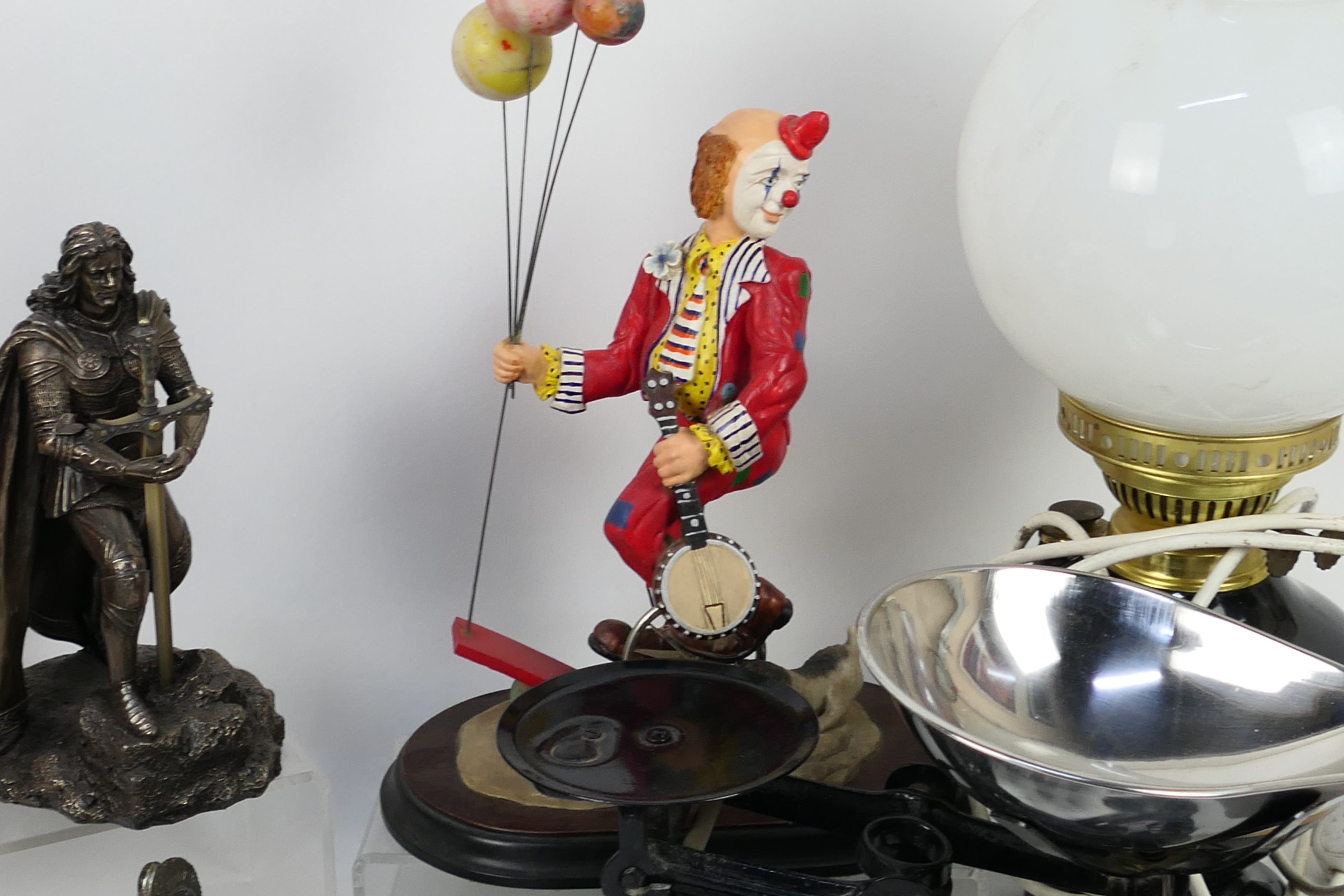 A mixed lot to include converted oil lamp, clown figure, scales, novelty table lighter and similar. - Image 3 of 6