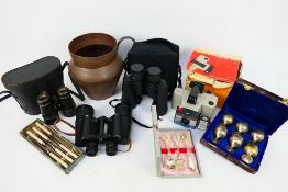 Collectables to include binoculars, camera, flatware and other.