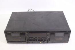 A vintage Pioneer Stereo Double Cassette Deck, model CT-W503R.