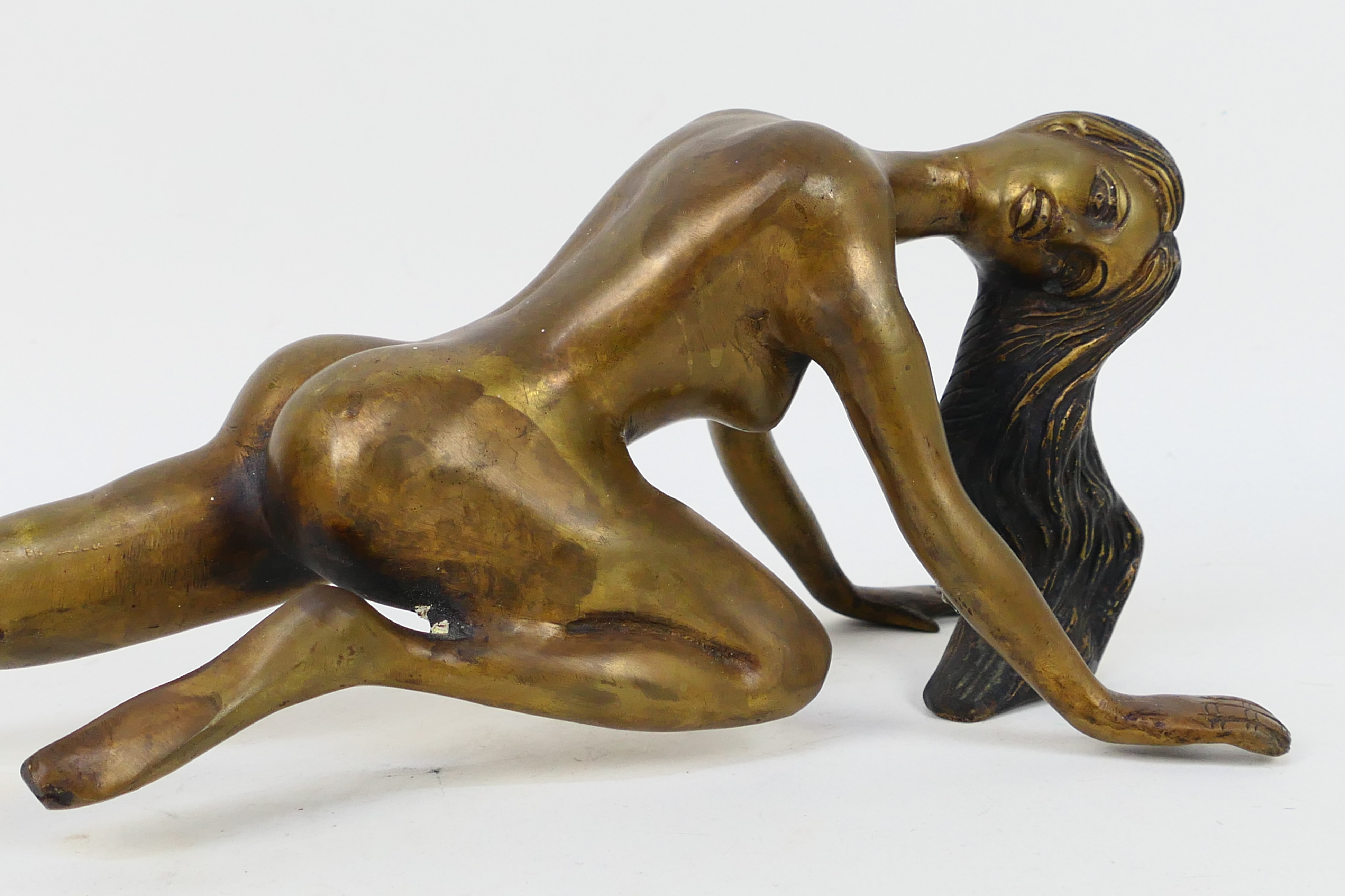 A cast bronze model depicting a female nude, approximately 49 cm (l). - Image 5 of 6