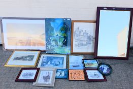 A collection of various pictures and a wall mirror, varying sizes.