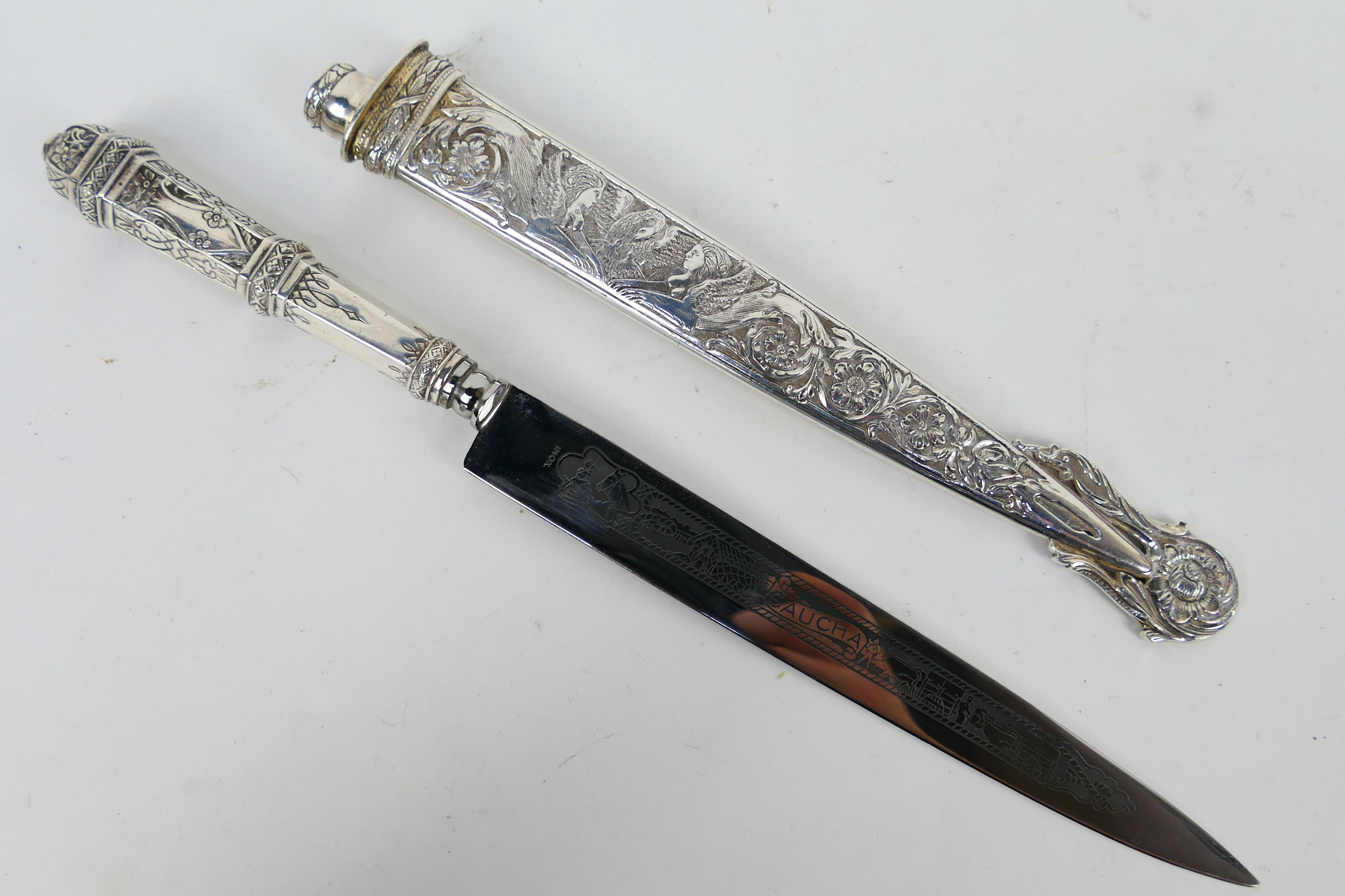 An Argentinian white metal Gaucho knife
