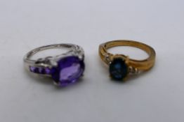 Two 9ct gold stone set rings comprising