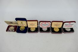 Six cased Isle Of Man silver crowns to i
