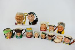 A collection of various character jugs,