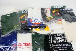 A quantity of T shirts, predominantly relating to beer / spirit brands.