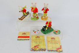 Four Royal Doulton The Rupert Bear Collection figures to include Rupert Takes A Ski-ing Lesson,