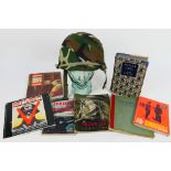 A replica World War Two (WW2 / WWII) American army helmet with glass display head and a quantity of