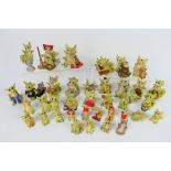 A collection of Real Musgrave The Whimsical World Of Pocket Dragon figures,