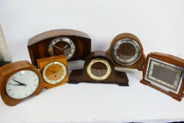 A quantity of mantel clocks to include Smiths, Kienzle and other.