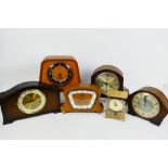 A quantity of mantel clocks to include Smiths, Bentima and other.