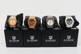 Four boxed Didun Design gentleman's wrist watches. [4].