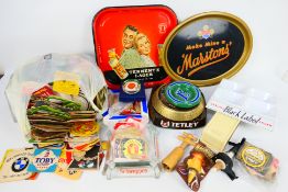 Breweriana to include vintage trays, ashtrays, bottle labels, beer mats and other.