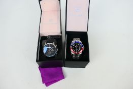 A boxed Pagani Design automatic wrist watch and a similar chronograph, both with paperwork. [2].