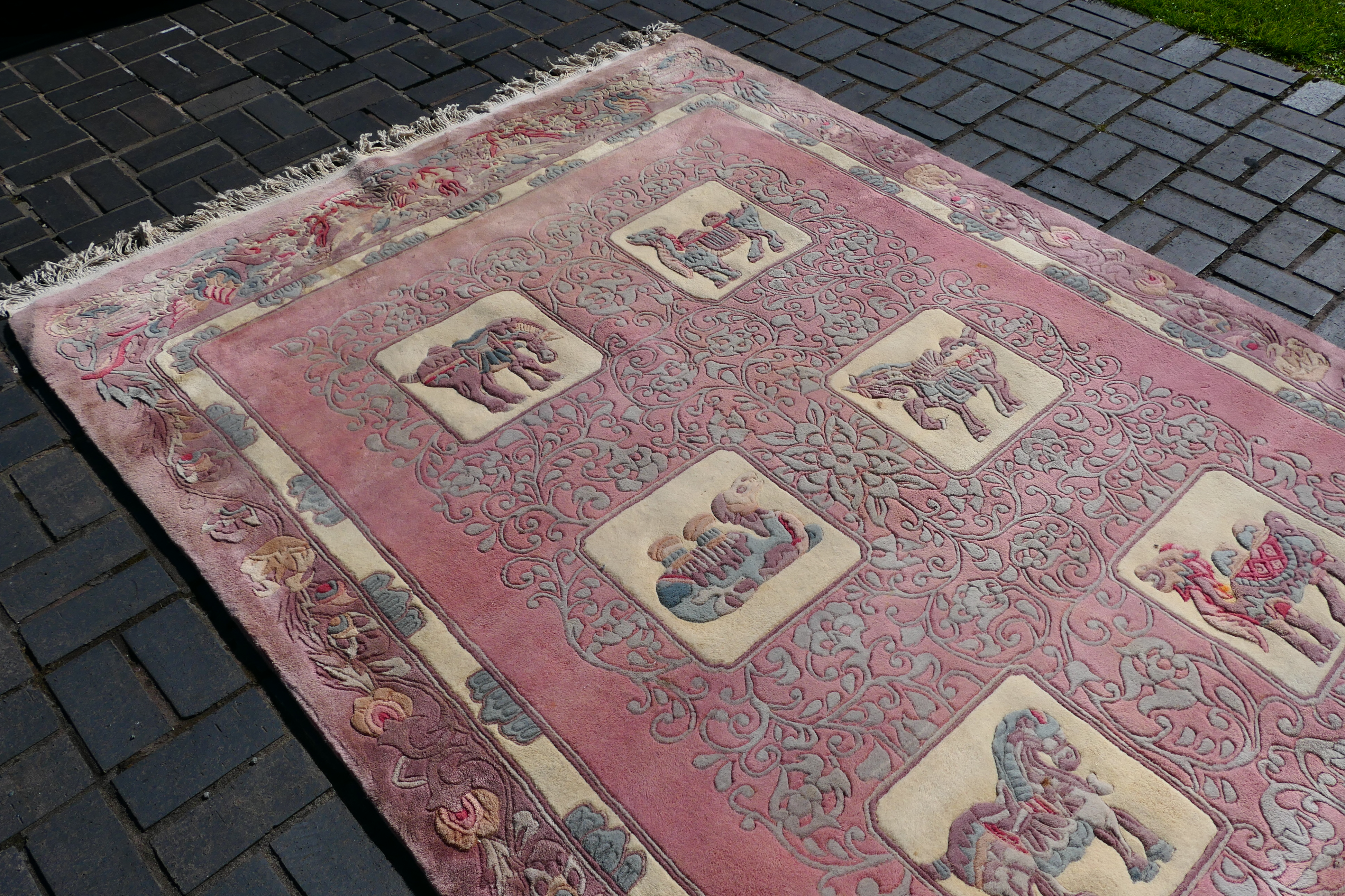 A large rug with animal decoration to include elephant, camel and other, - Image 4 of 7